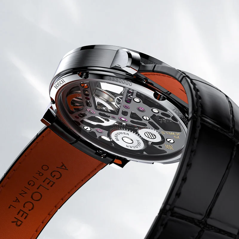 Close-up of a watch with an orange-lined black leather strap